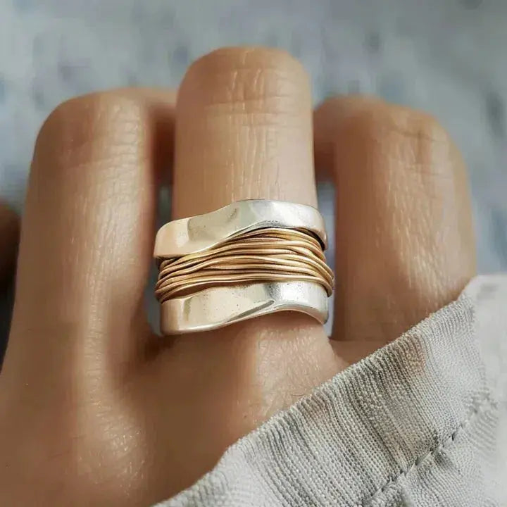 Elegant silver ring with refined gold accents
