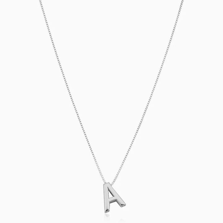 Refined white gold necklace with initial pendant.