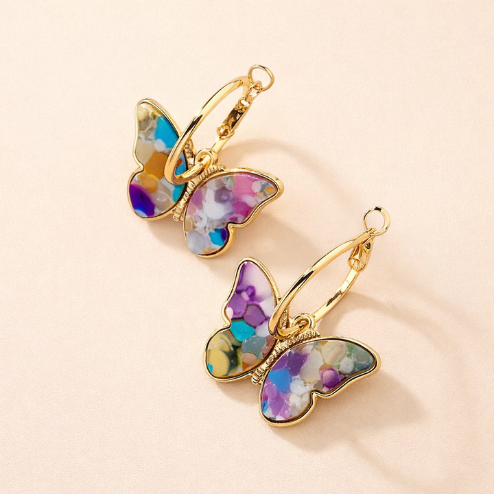 Butterfly earrings with colorful details.