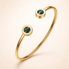 Elegant Gold Bracelet with Green Accents