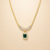 Elegant Gold Pendant with Emerald Prism