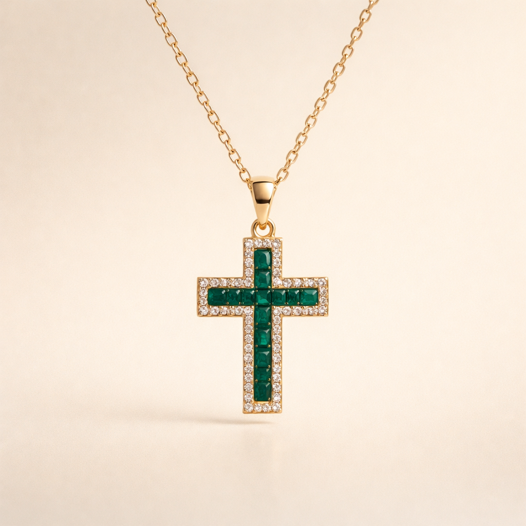 Elegant gold necklace with emerald cross pendant