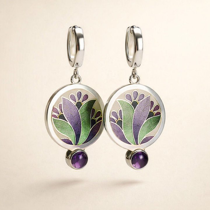 Elegant white gold earrings with purple crystals