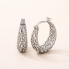 Elegant white gold earrings with a refined shape