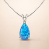 Soft white gold drop necklace with opal accent
