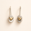 Elegant gold earrings with little heart