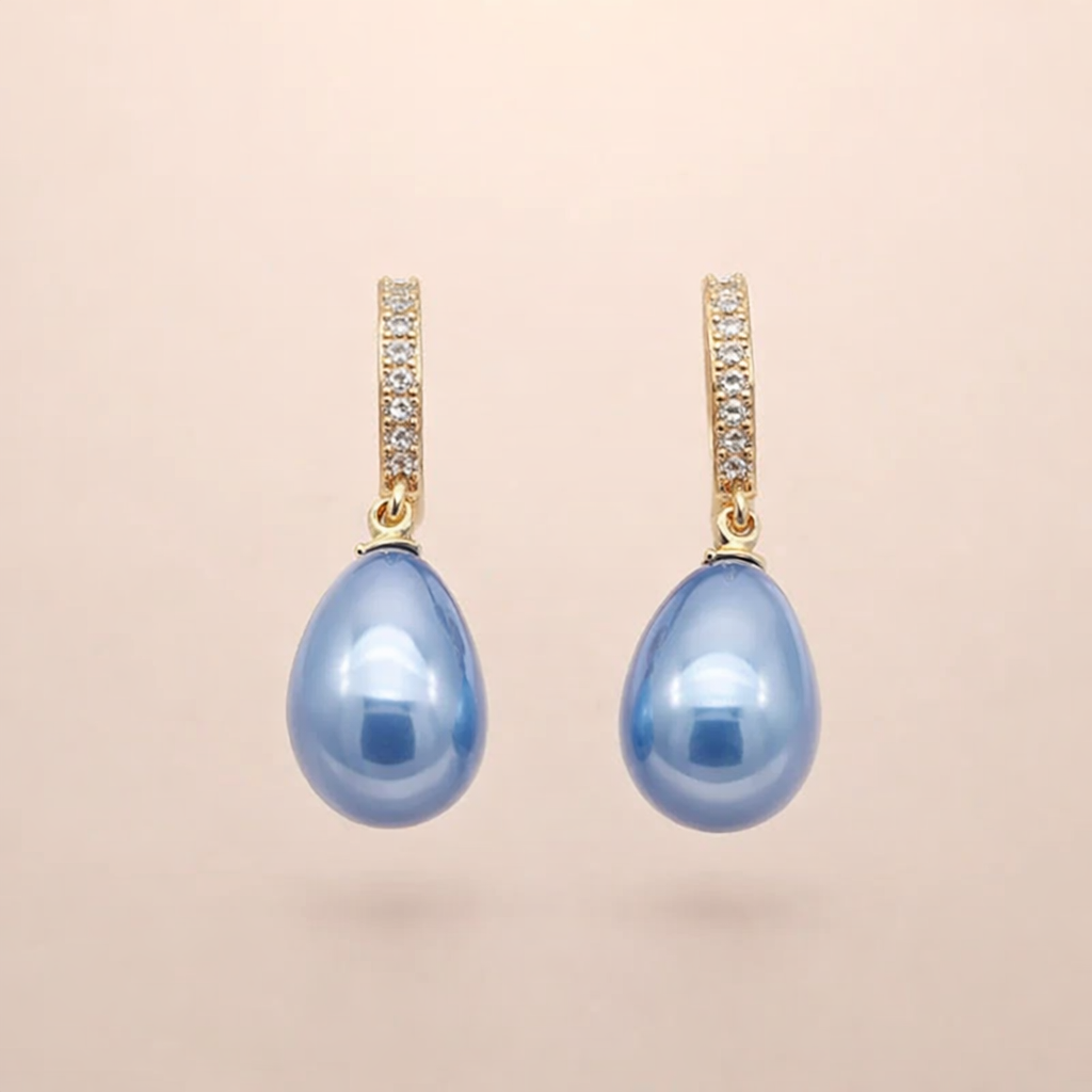 Soft Waves gold-colored earrings with blue cubic zirconia