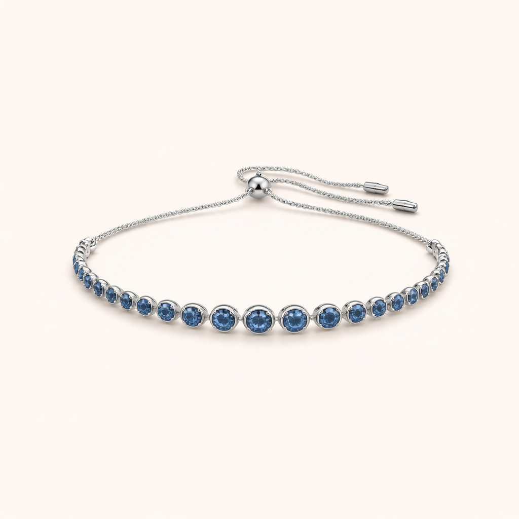 Elegant white gold tennis bracelet with cut sapphires