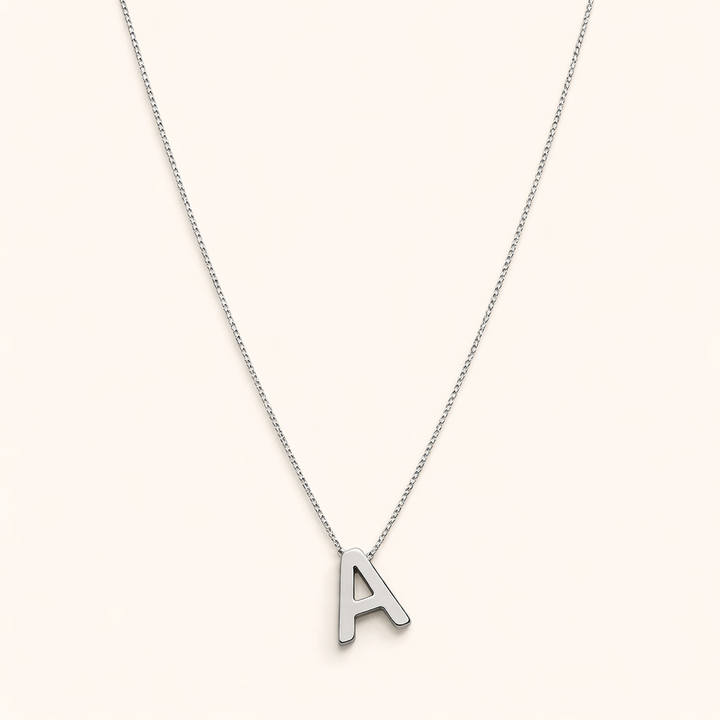 Refined white gold necklace with initial pendant.