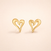 Elegant gold earrings with little heart