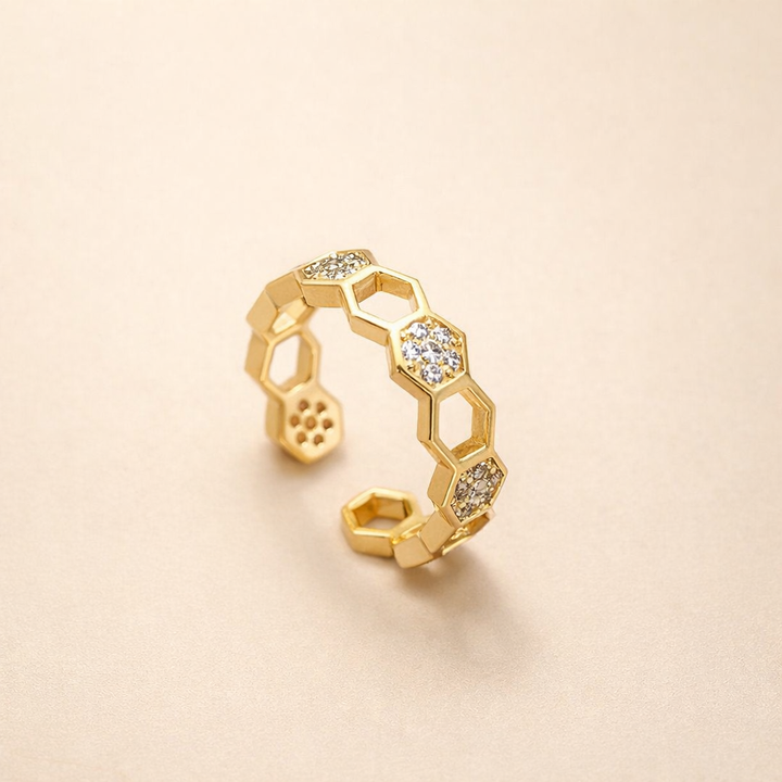 Refined gold ring with sparkling crystals