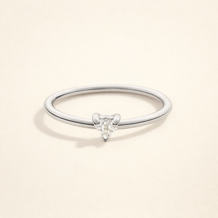 Delicate cubic zirconia ring with little heart