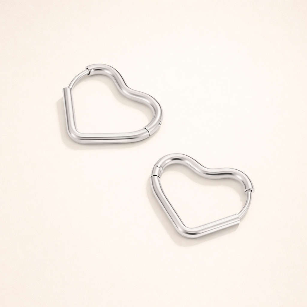 Elegant silver earrings with heart-shaped details