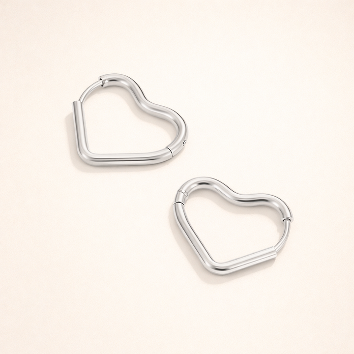 Elegant silver earrings with heart-shaped details