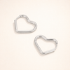Elegant silver earrings with heart-shaped details