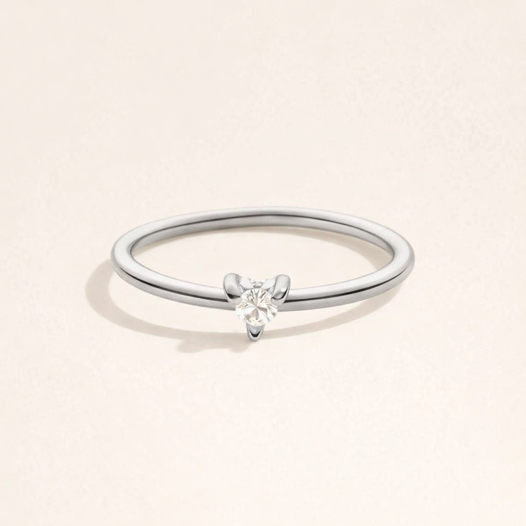 Refined cubic zirconia ring with little heart