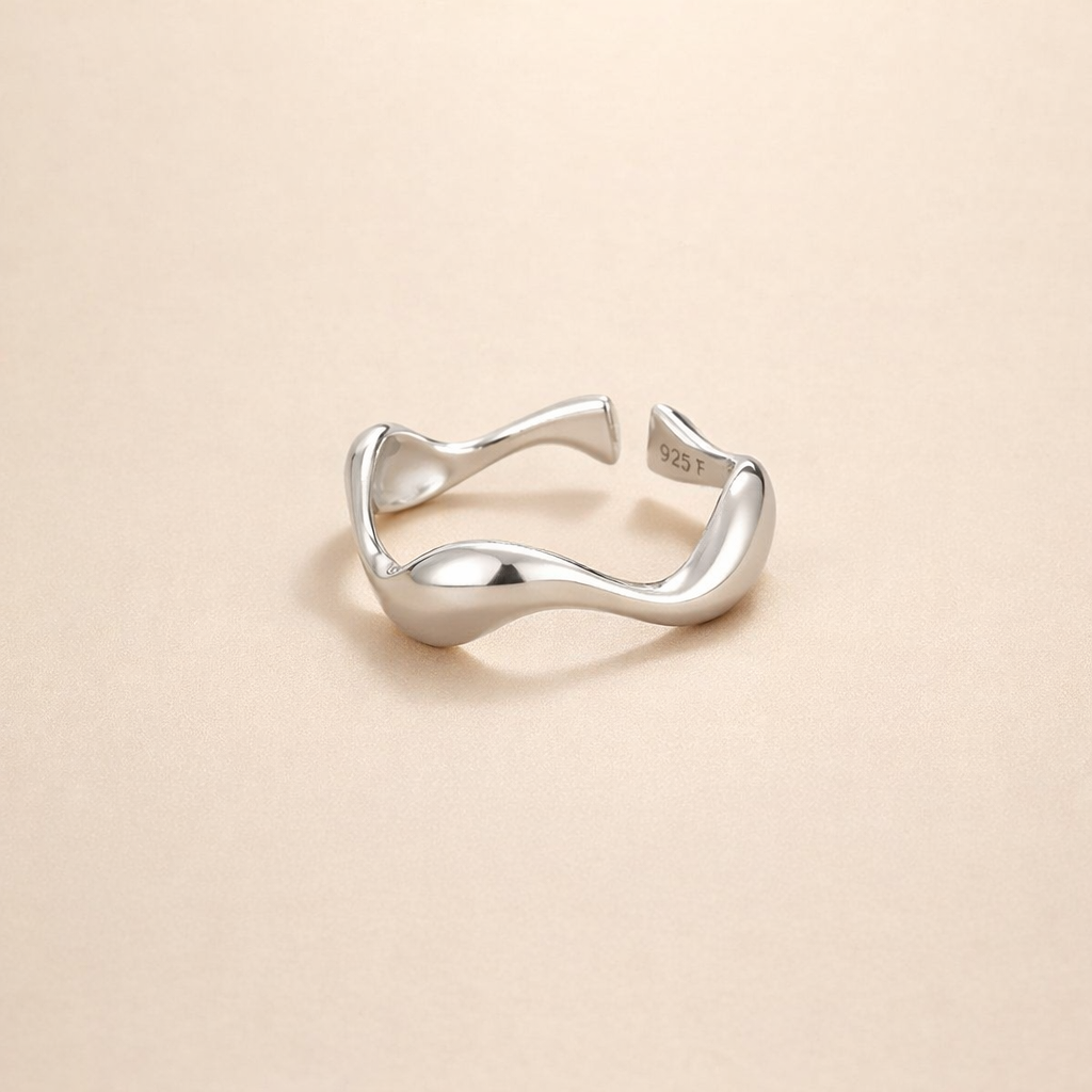 Elegant silver wave ring with refined lines