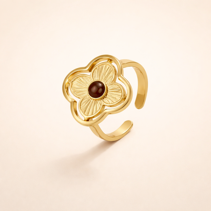 Silver ring with tiger's eye and delicate flower motifs