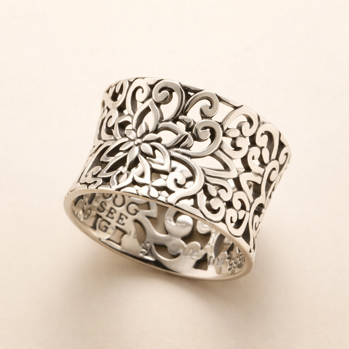 Elegant silver hollow ring with refined details