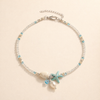 Silver anklet with shell and natural stones