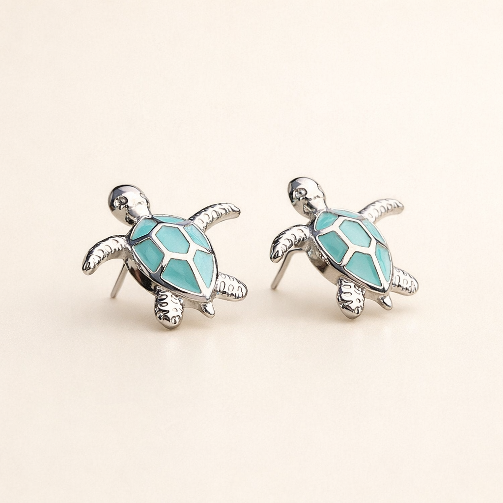 Silver earrings with opal in sea turtle design