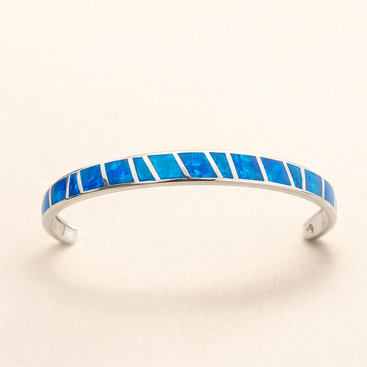 Silver bracelet with blue opal and refined details