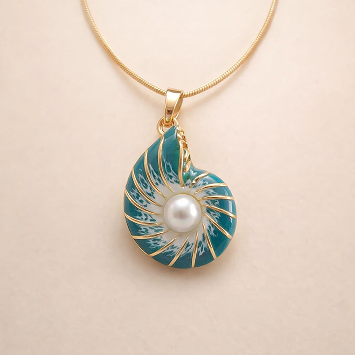Soft blue pearl necklace with shell elements