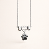 Delicate Dog Paw Pendant in Stainless Steel