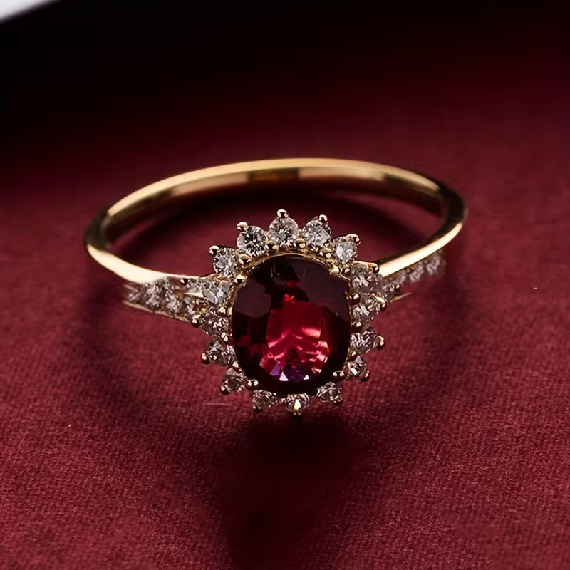 Elegant gold ring with red cubic zirconia