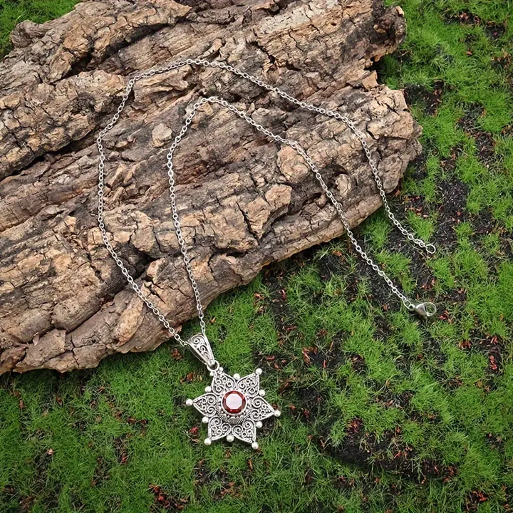 Elegant white gold necklace with subtle dangling stones
