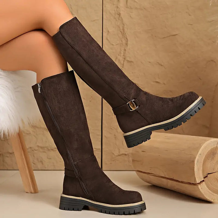 High boots with a thick, non-slip sole.