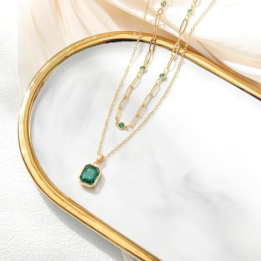 Gold necklace with four-leaf clover