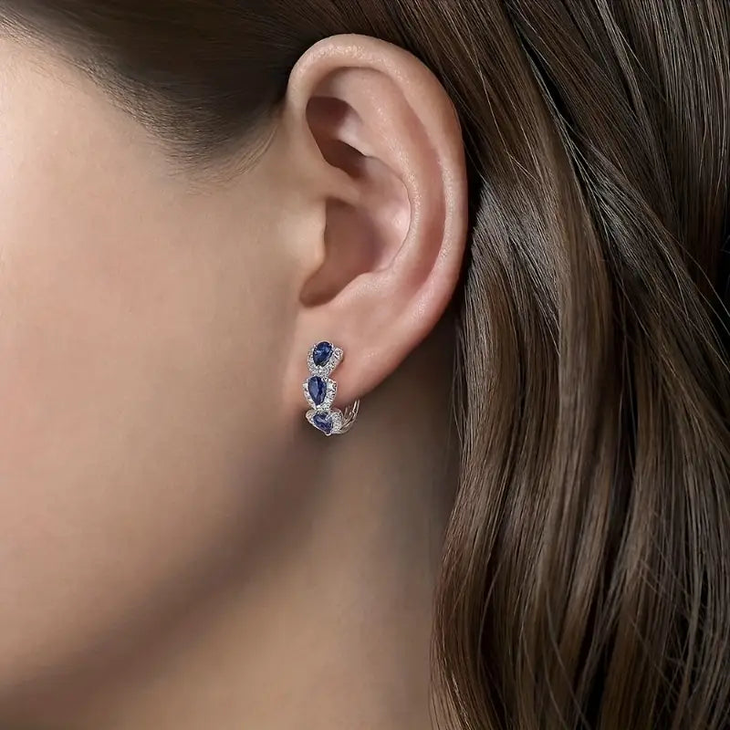 Elegant white gold earrings with sapphire accents