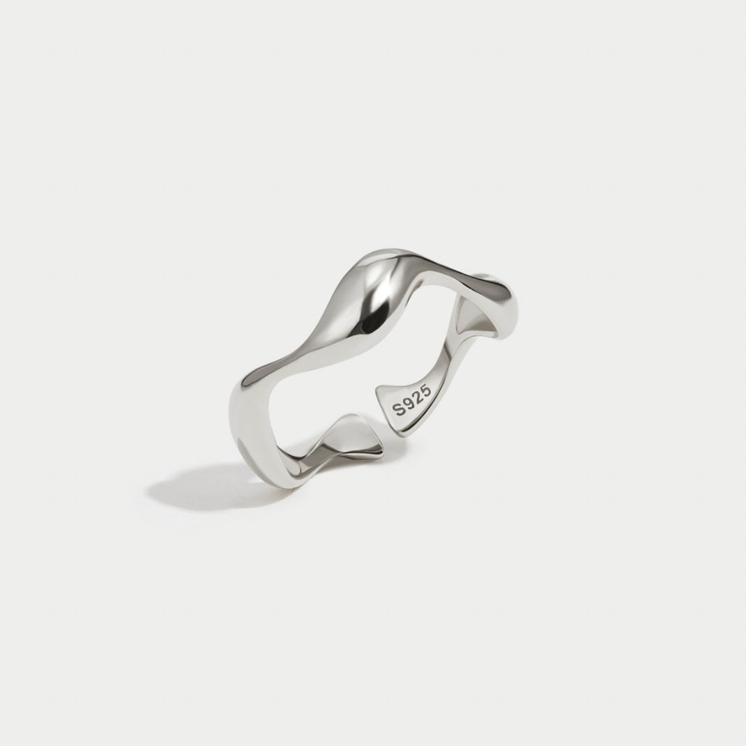 Elegant silver wave ring with refined lines