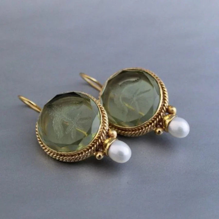 Elegant white gold earrings with green stone and pearl