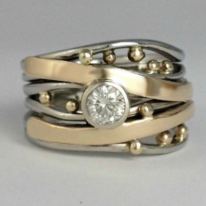 Elegant Gold Ring with Cubic Zirconia and Refined Inner Detail