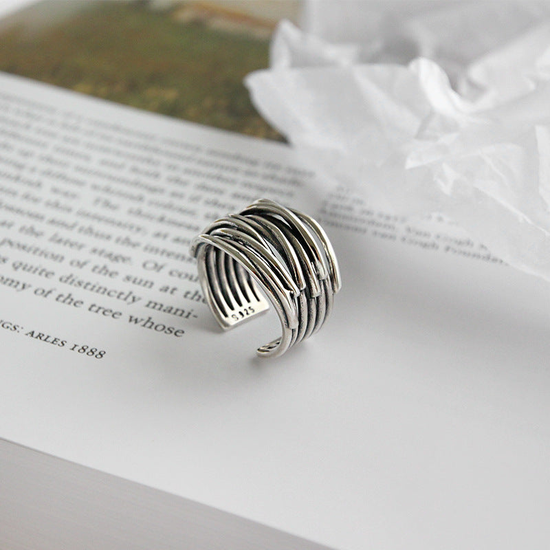 Adjustable layered silver ring