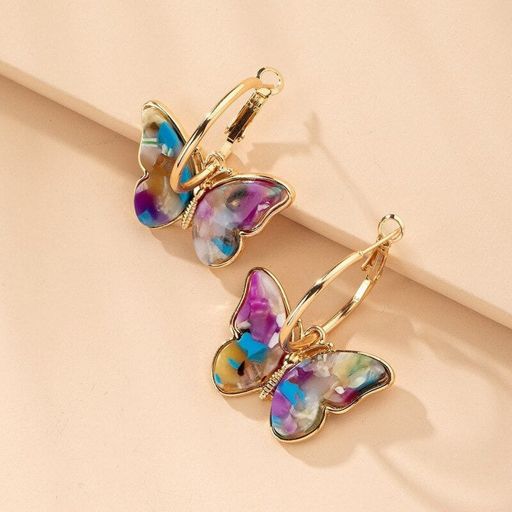 Butterfly earrings with colorful details.