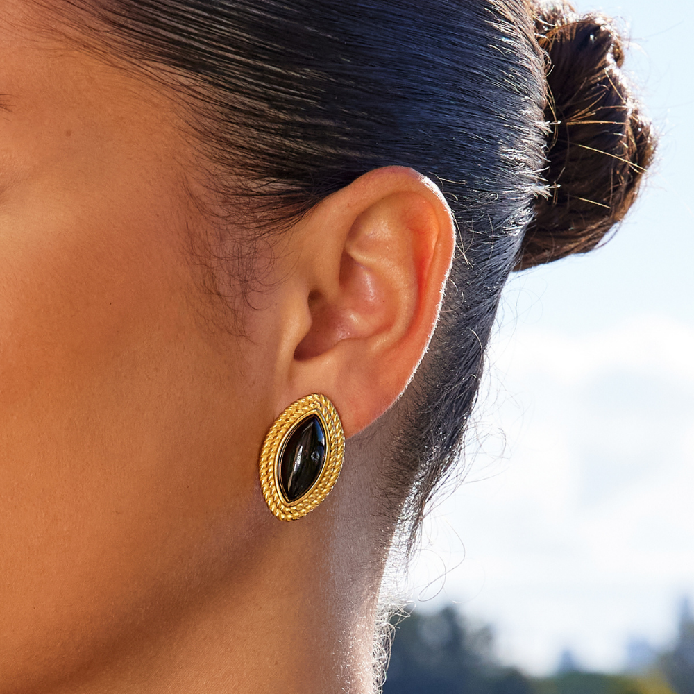 Elegant gold earrings with black accents