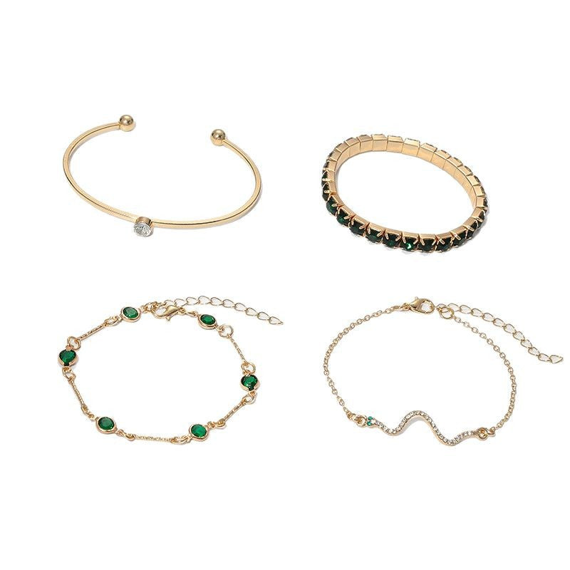 Elegant gold bracelet set with refined details