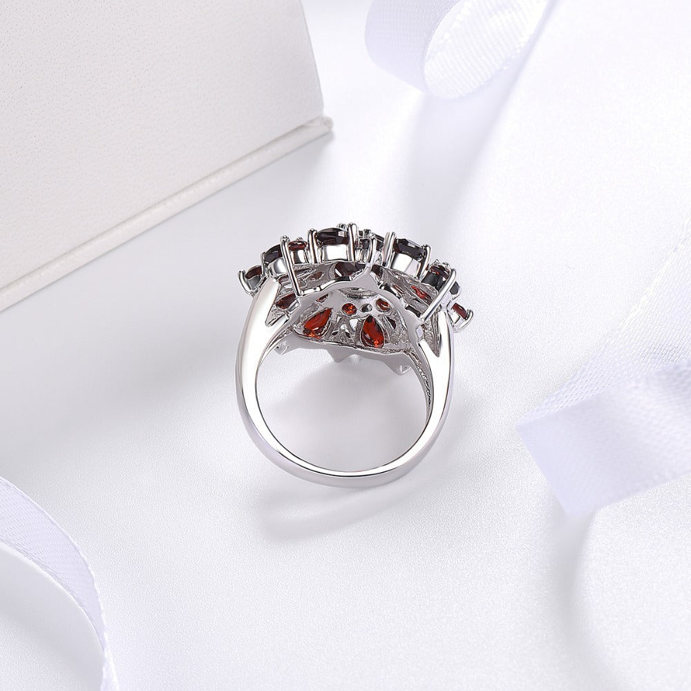 Elegant gold ring with scarlet petals