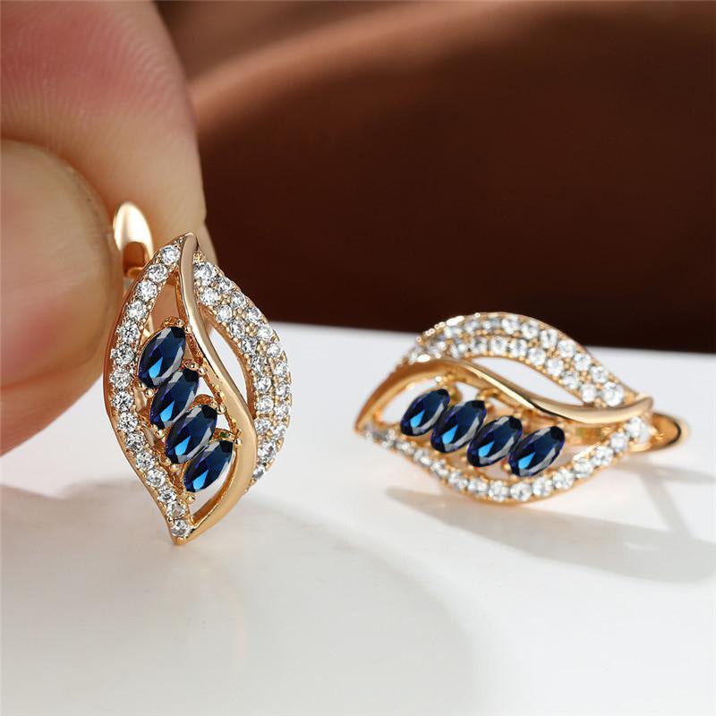 Ethereal gold earrings with delicate cubic zirconia