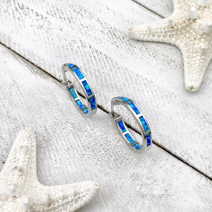 Elegant silver earrings with opal in ocean style