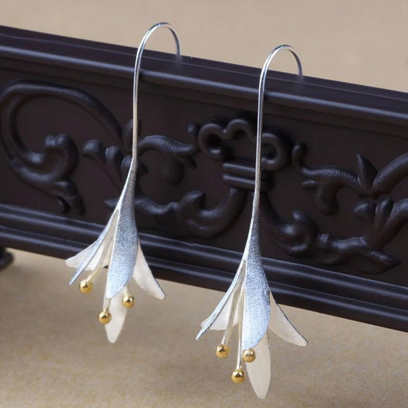 Soft Blossom Silver Earrings with Delicate Details
