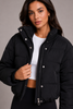 Women's short quilted down jacket with hood and slim fit