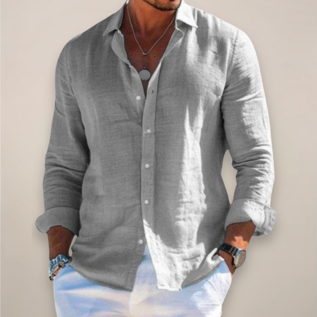 Relaxed-fit men's linen shirt with front button placket and long sleeves.