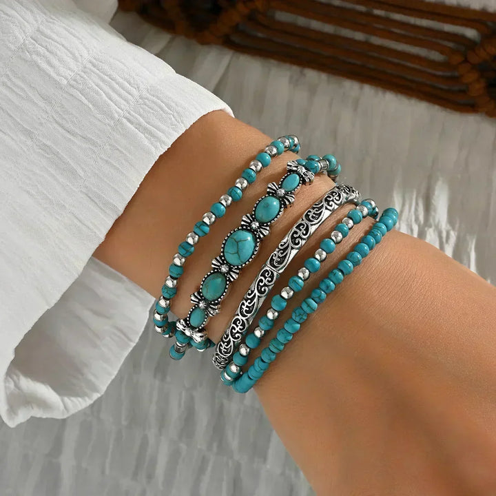Set of 5 Bracelets with Turquoise Beads and Silver-Colored Details.