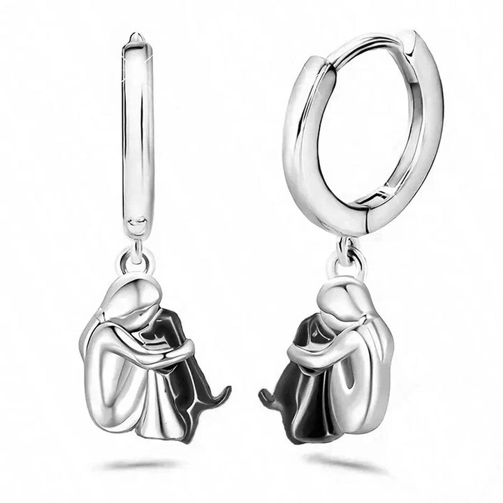 Minimalist silver earrings with little dog