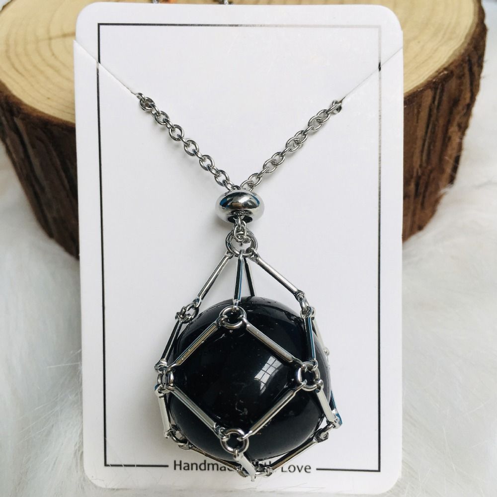 Necklace with interchangeable crystal stone for radiant style and harmony.