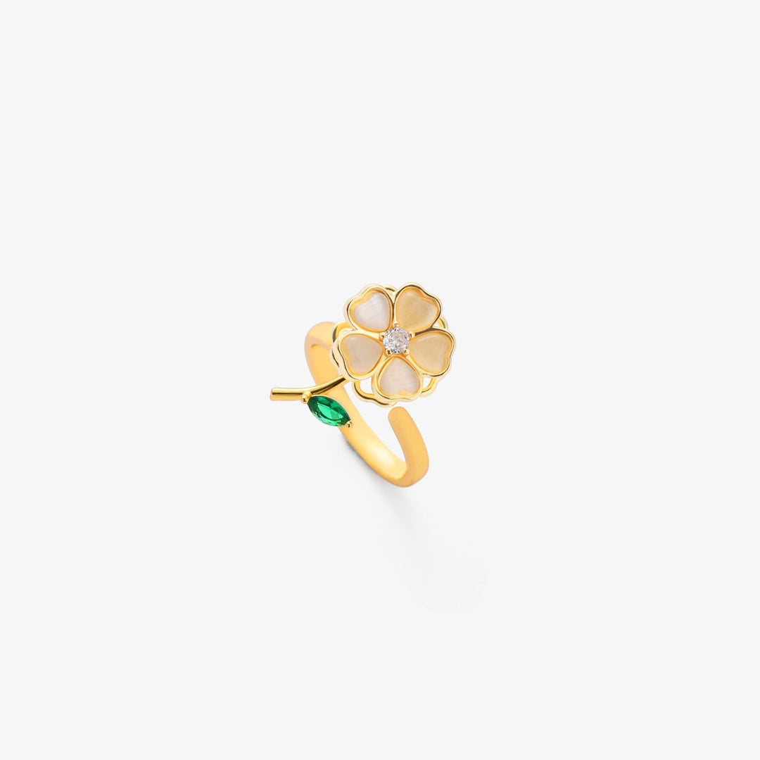 Elegant gold ring with rotating leaves